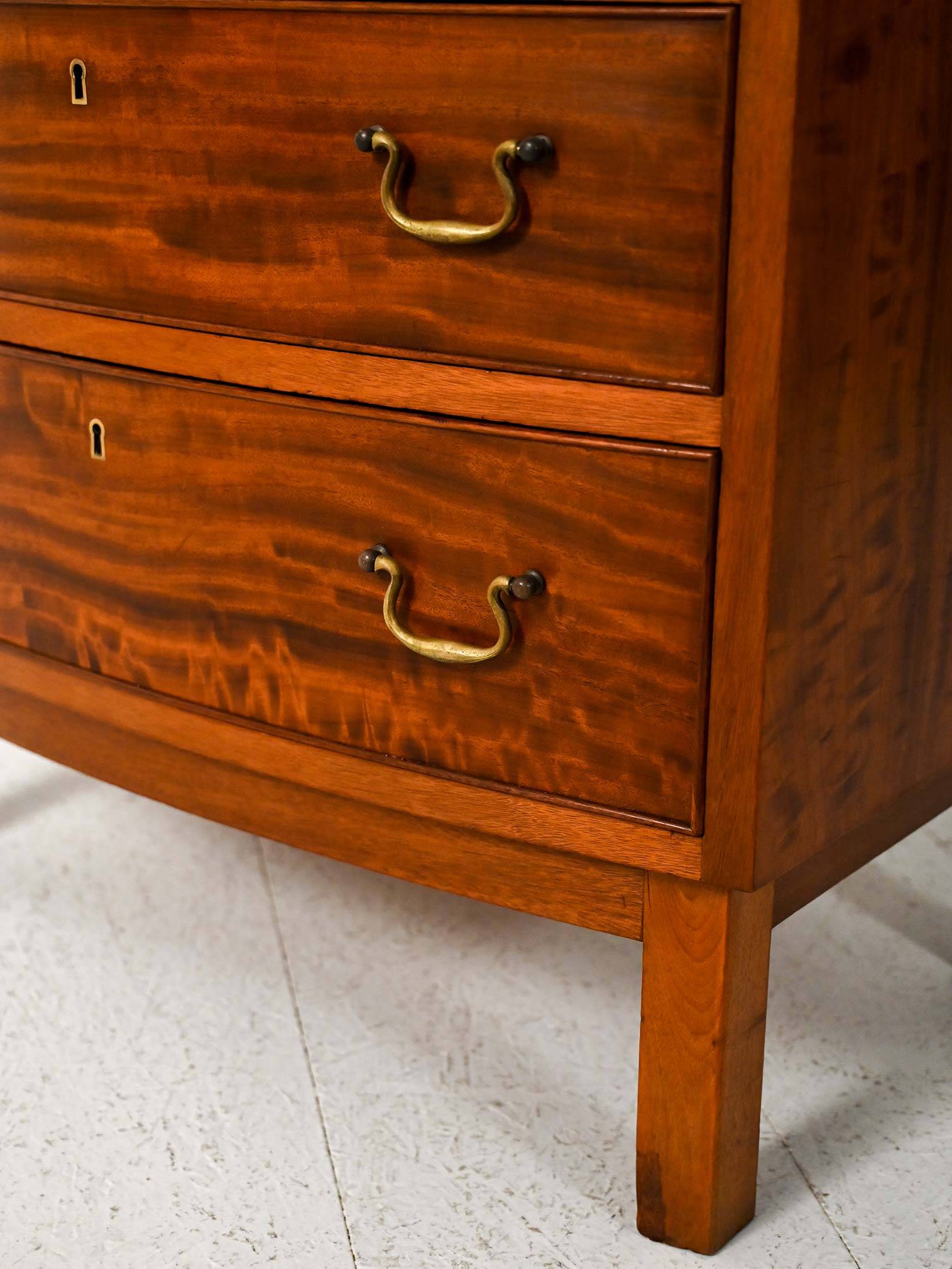 Scandinavian mahogany tallboy with brass handles