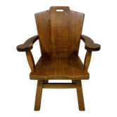 Fauteuil brutaliste rustique en chêne massif des années 1960.
