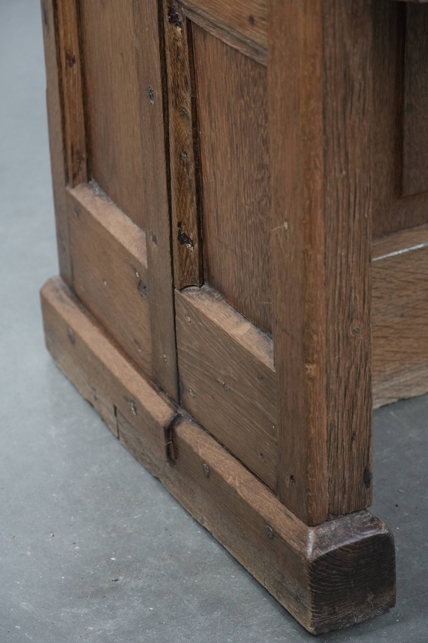 Antique oak church bench in Gothic style with beautiful wood carving