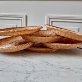 Underside of vintage wicker plates 70s