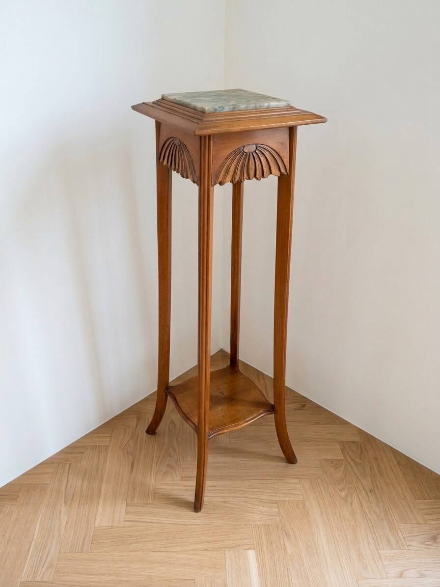 Side table with marble top.