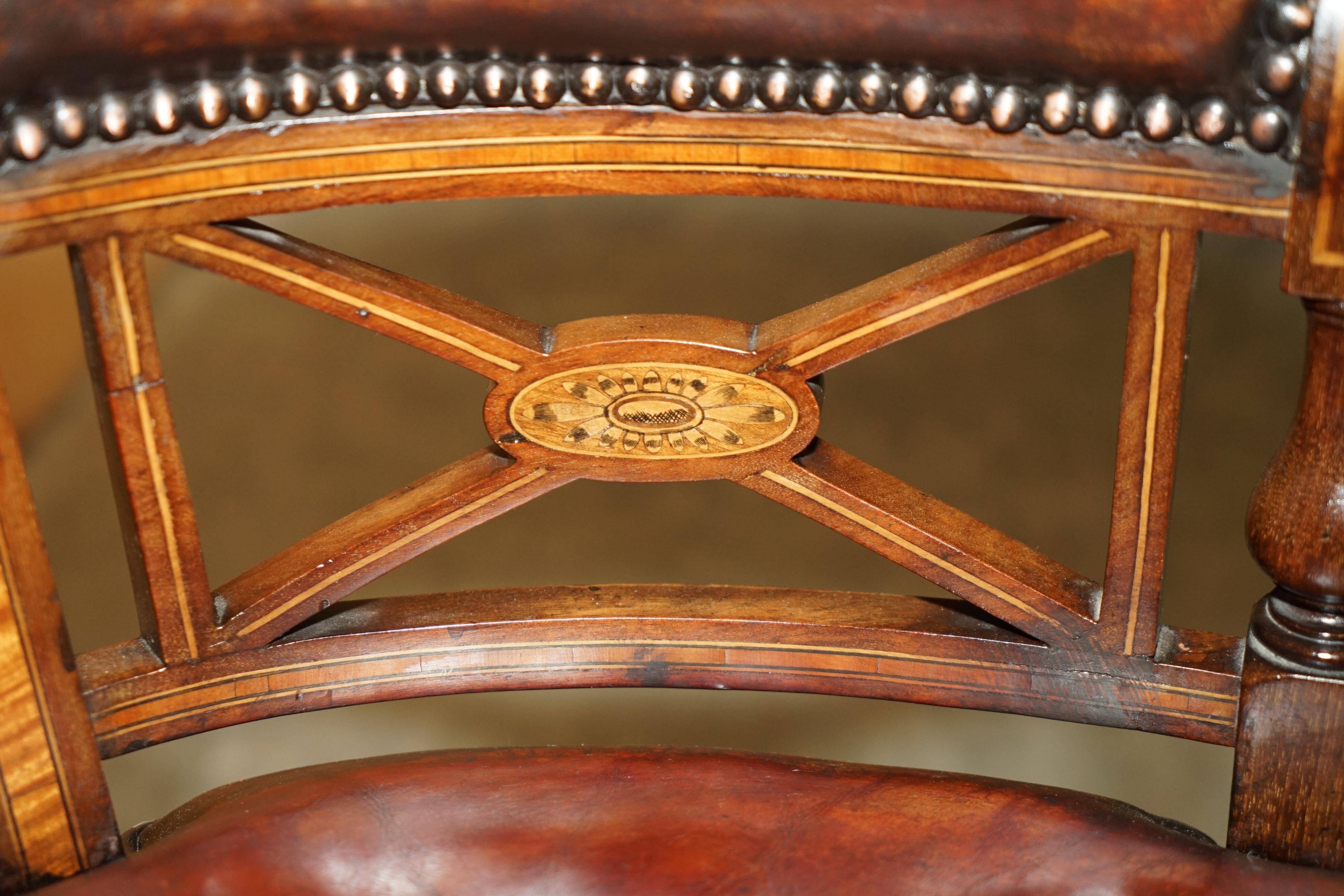 Victorian captain's chair in leather restored by Cornelius V Smith.