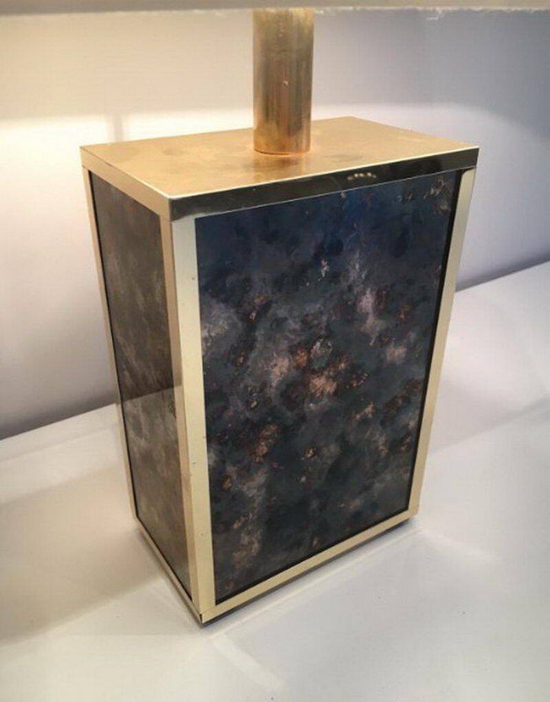 Lamp in gilded metal and stylized glass. In the style of Aldo Tura