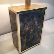 Lamp in gilded metal and stylized glass. In the style of Aldo Tura