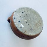 Signed sandstone candle holder