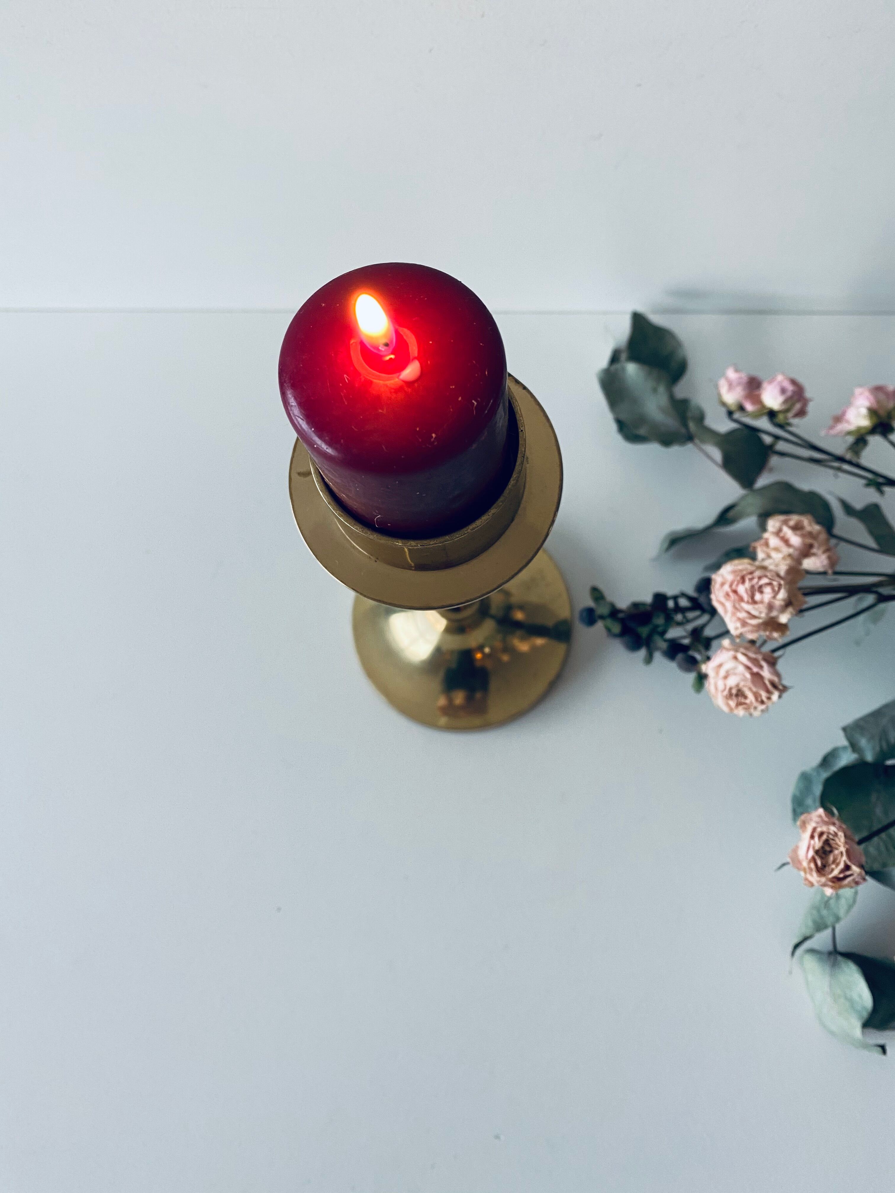Golden brass candle door