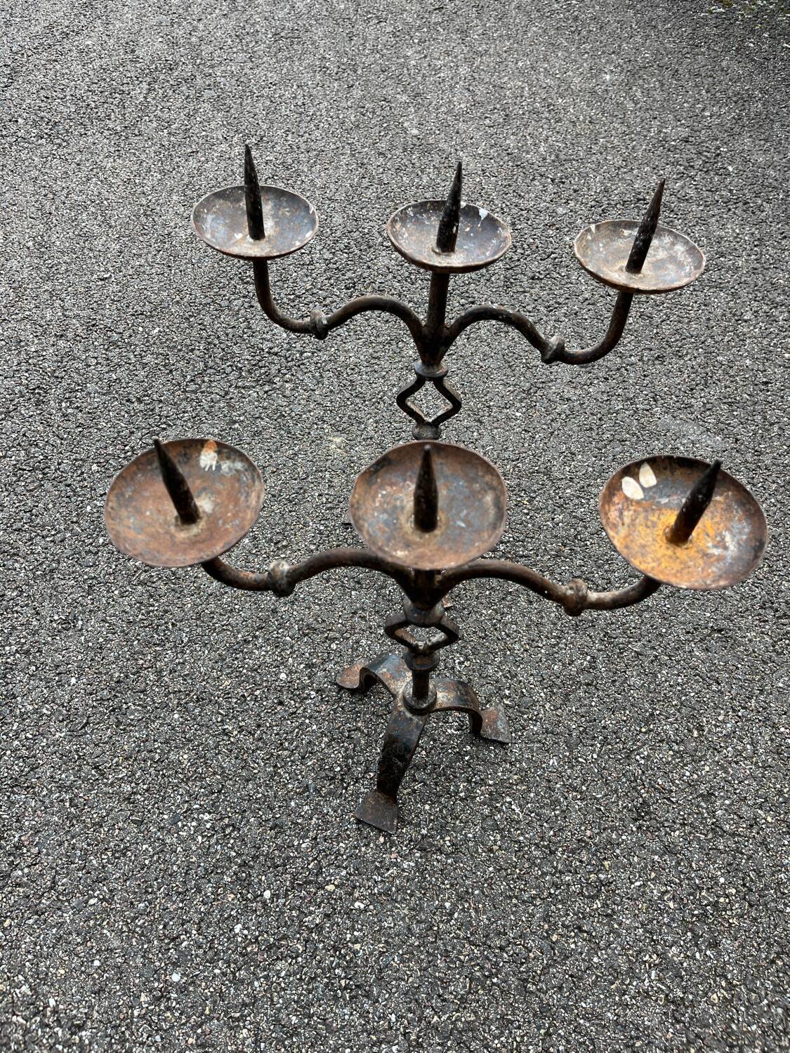 Pair of antique brutalist wrought iron candlesticks