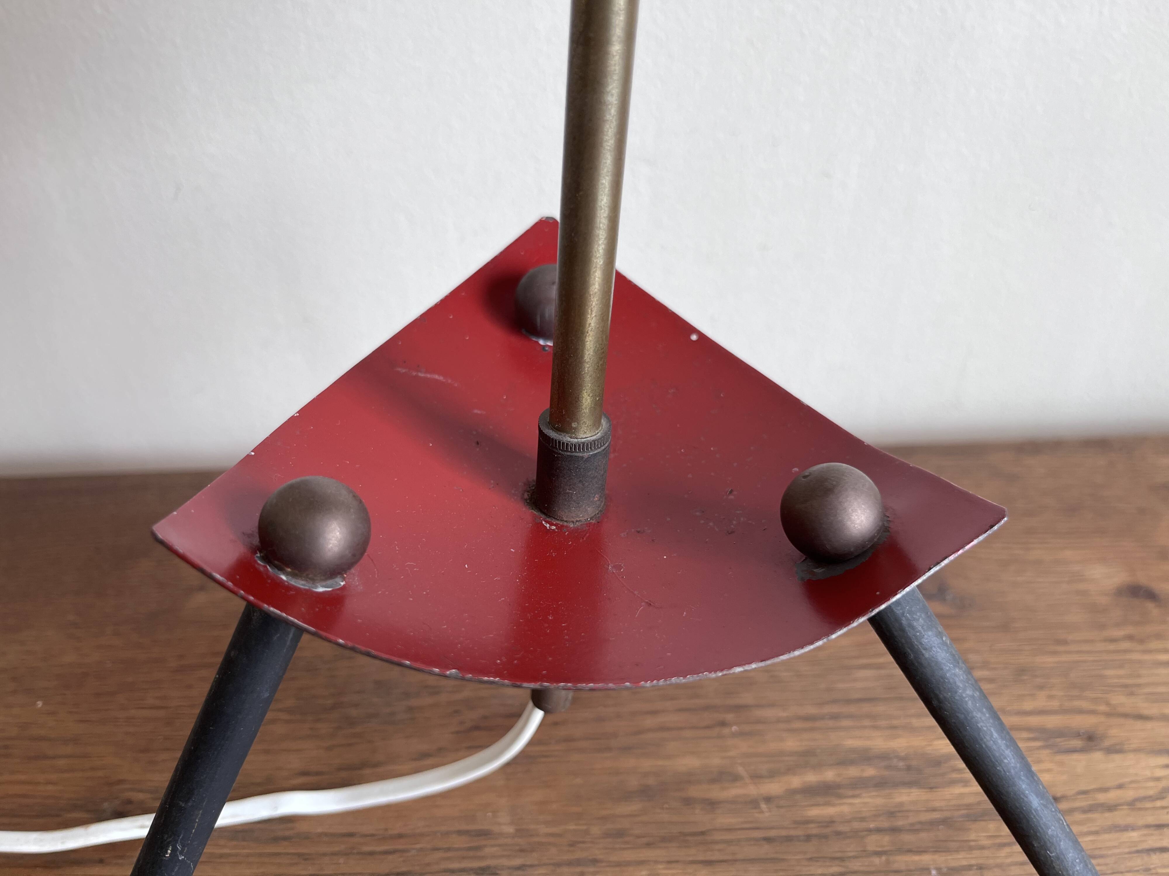 1950s modernist tripod lamp made of sheet metal and brass.