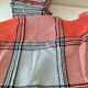 Tablecloth and 12 coral and grey napkins in a retro Scandinavian 1960s style.