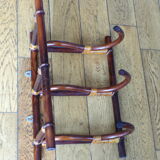 Rattan wall coat rack