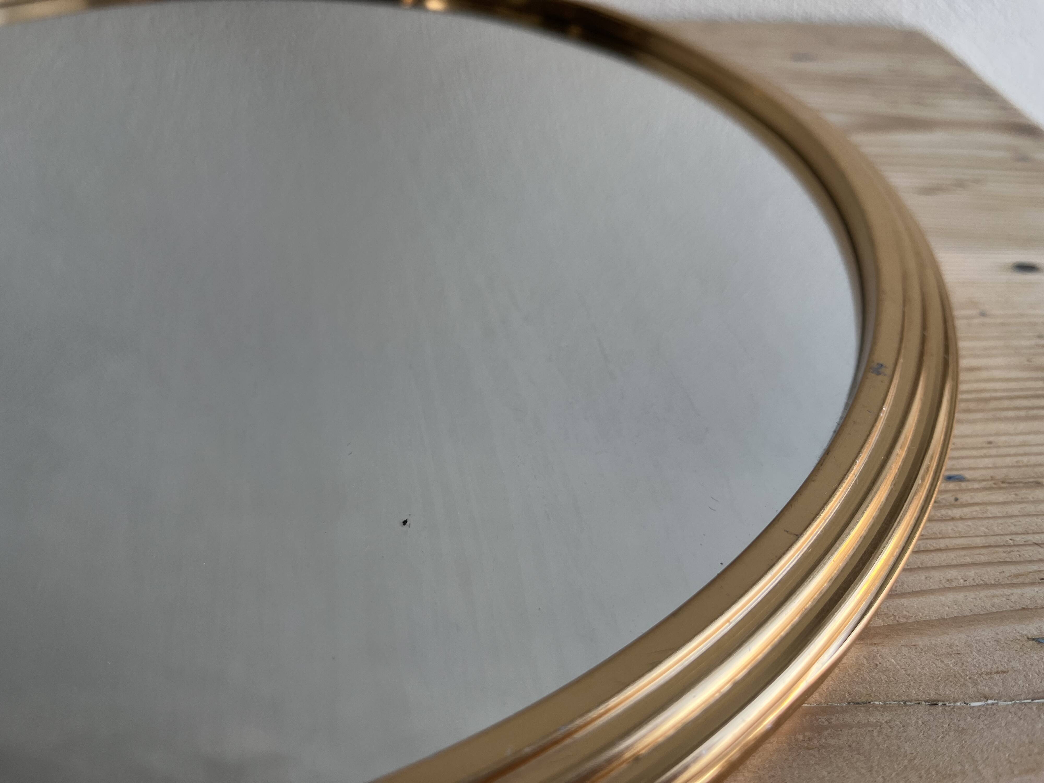 Vintage round gold mirror