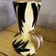 Vase en céramique jaune et noire à décor de feuilles, Vallauris signé JTF numéroté 519