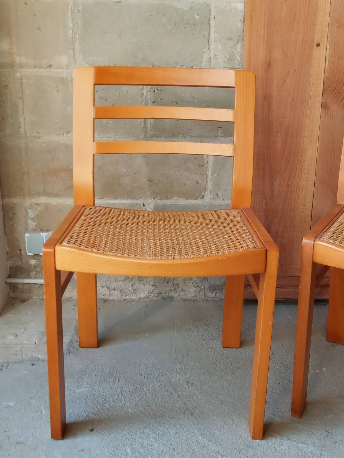 Pair of Baumann caned chairs, 70s/80s