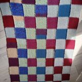 Hand knitted patchwork plaid