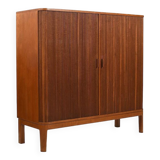 Armoire danoise à porte tambour en teck des années 1950