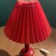 Wooden foot lamp with folded cardboard lampshade