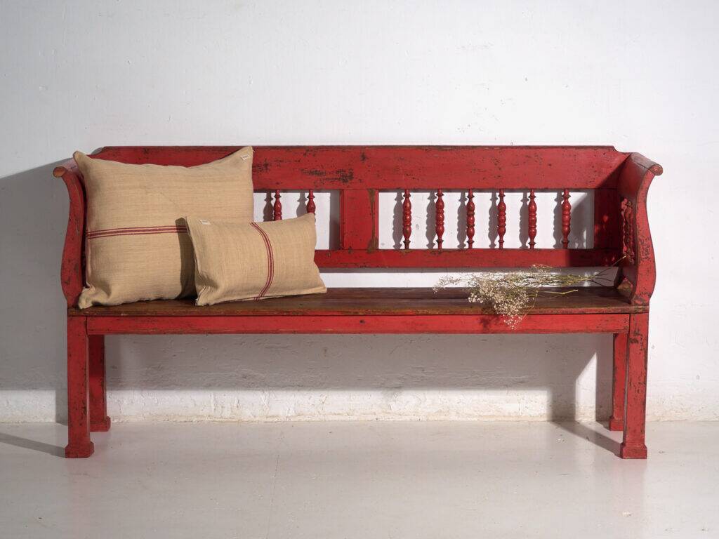 Old red-painted pine bench with turned backrest – Central Europe, circa 1900
