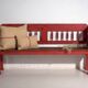 Old red-painted pine bench with turned backrest – Central Europe, circa 1900