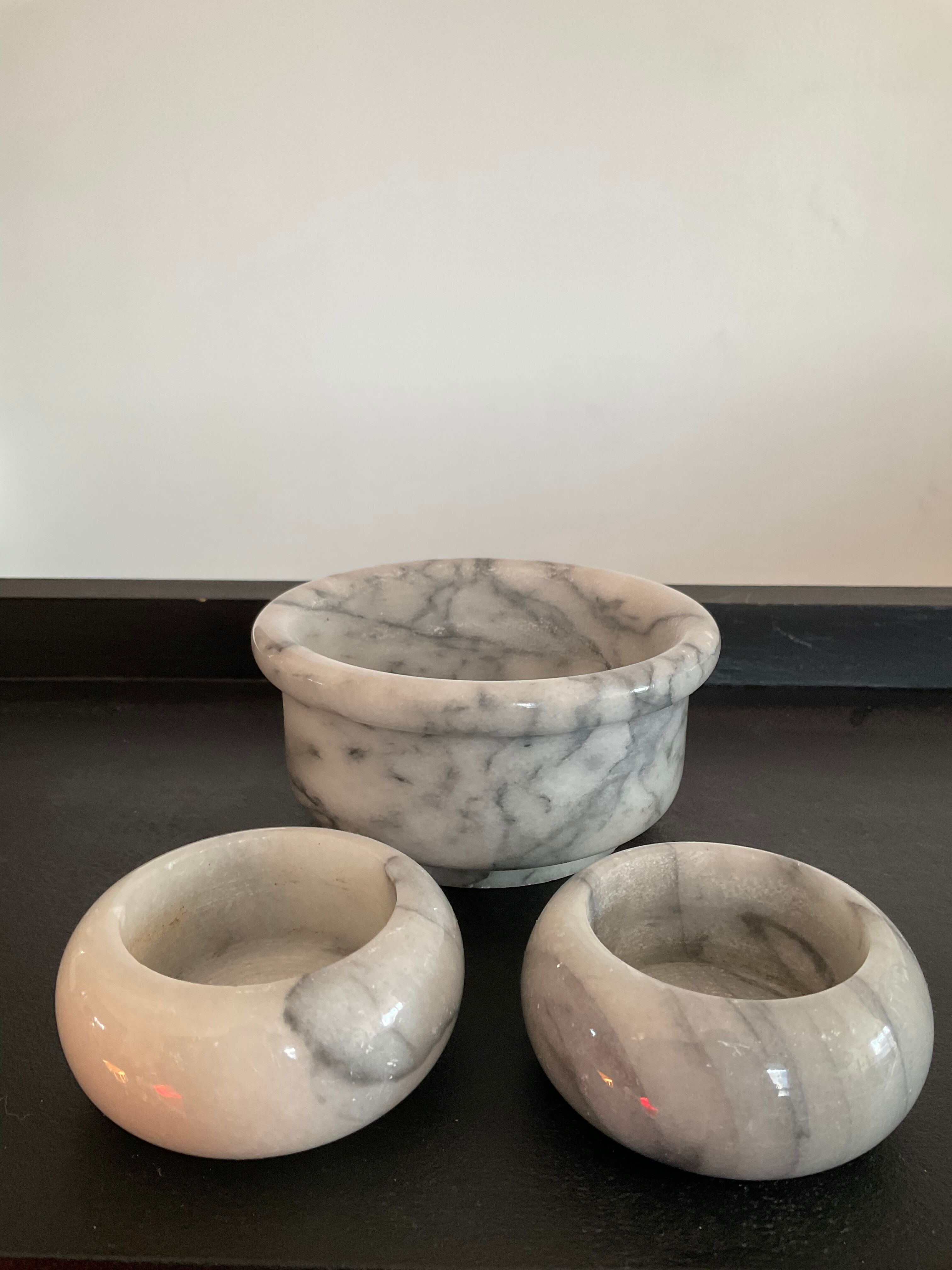 Trio of vintage candle holders in white marble