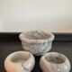 Trio of vintage candle holders in white marble