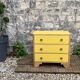 Commode art déco jaune poudré et bois brut