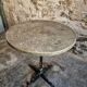 Bistro table / old garden with a cast iron base and stone top, France