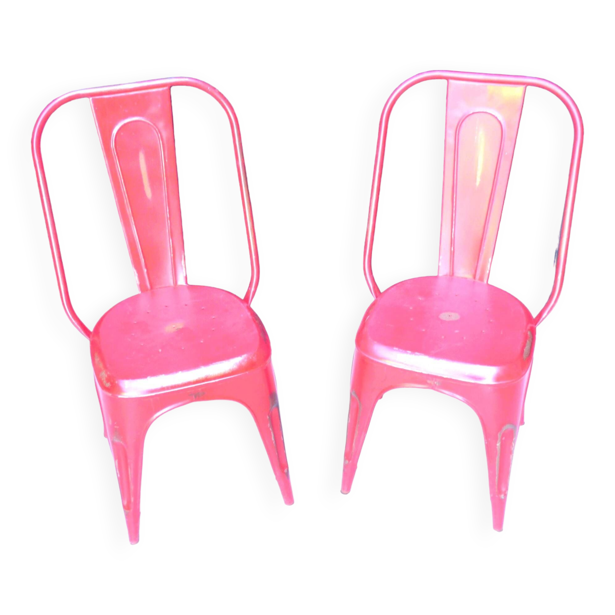 Pair of red stackable metal chairs