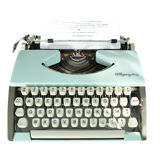 New ribbon revised turquoise olympia deluxe typewriter
