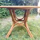 Canned rattan dining table and vintage glass