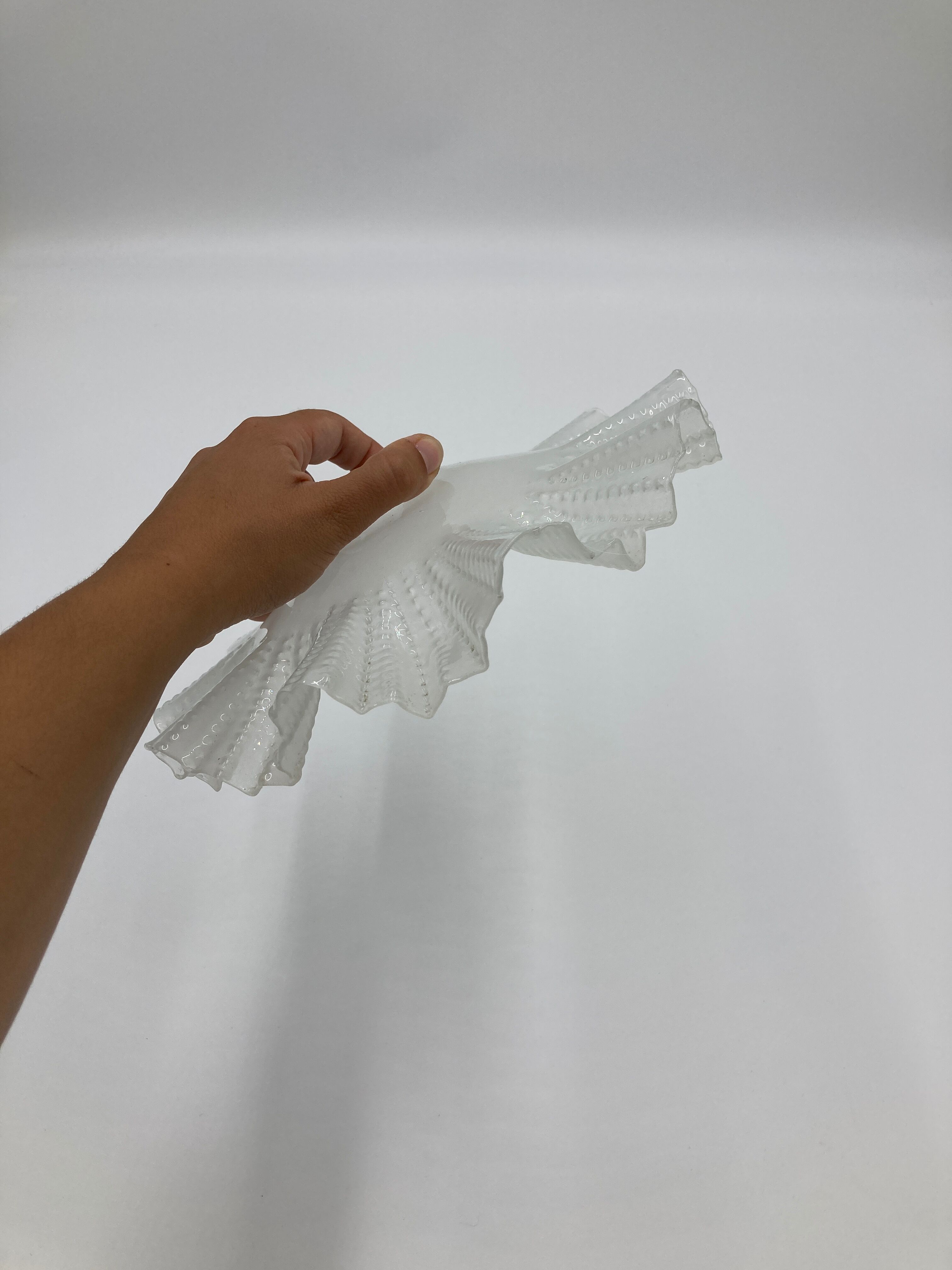 Corrugated glass suspension