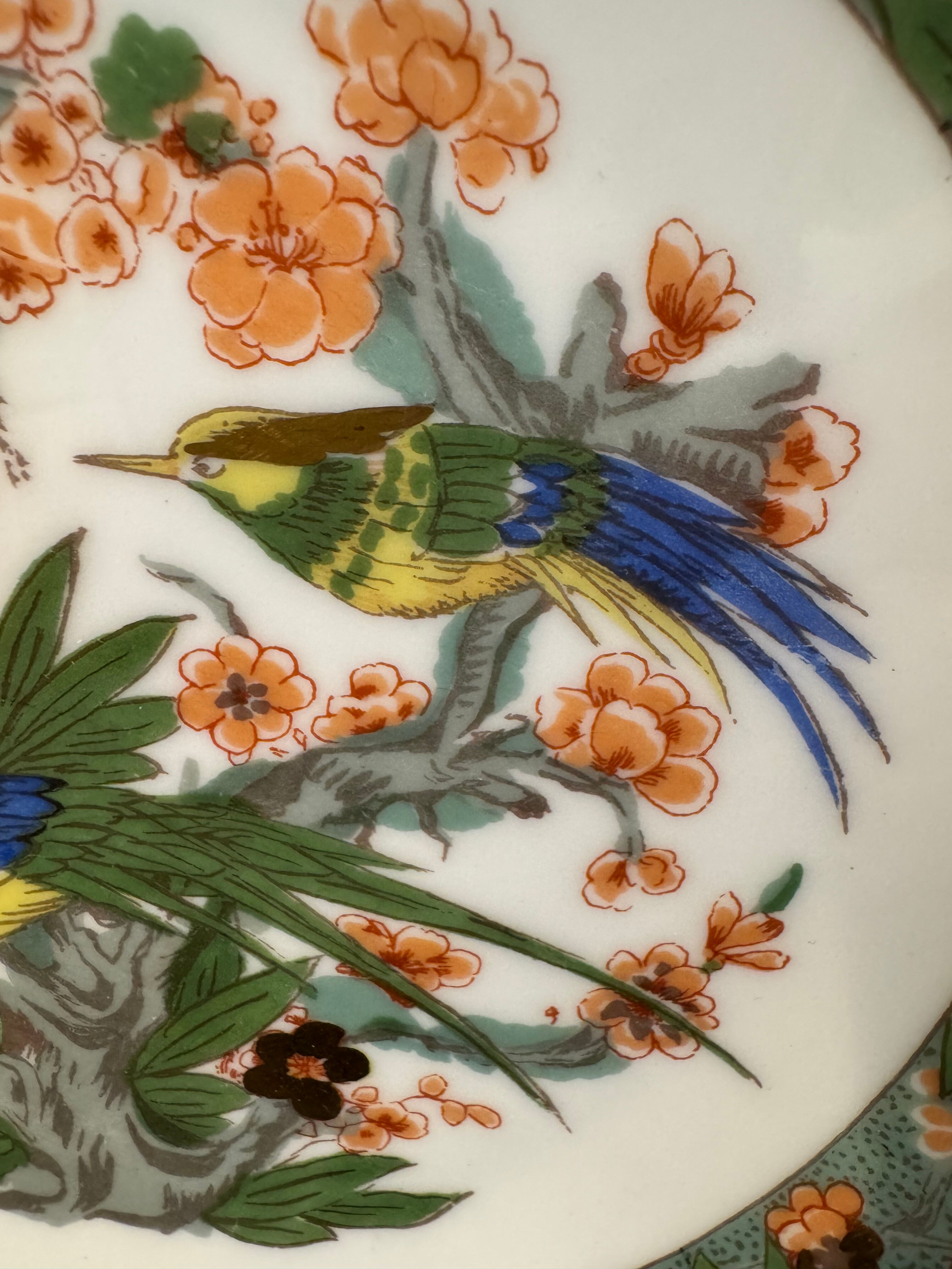 Two Raynaud Limoges plates and Tetard brothers silver.