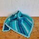 Vintage turquoise and lagoon blue crochet children's blanket