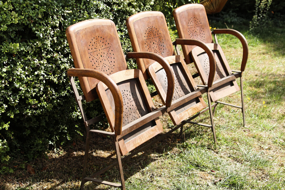 Row of theater folding seats, early twentieth century