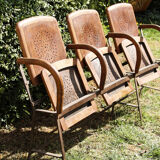Row of theater folding seats, early twentieth century