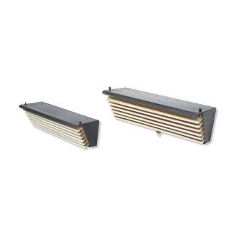 Pair of modernist metal wall lamps, model 212, by Jacques Biny for Luminalite