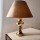 Gilded ceramic table lamp by Gustav Leek, Luxus, 1960s.