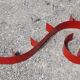 Red lay metal "snail" wall shelf