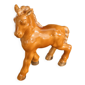 Ceramic horse sculpture with wild glaze and gold, signed Art Deco.
