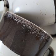 Set of three two-tone mugs, glazed stoneware, café workshop style.
