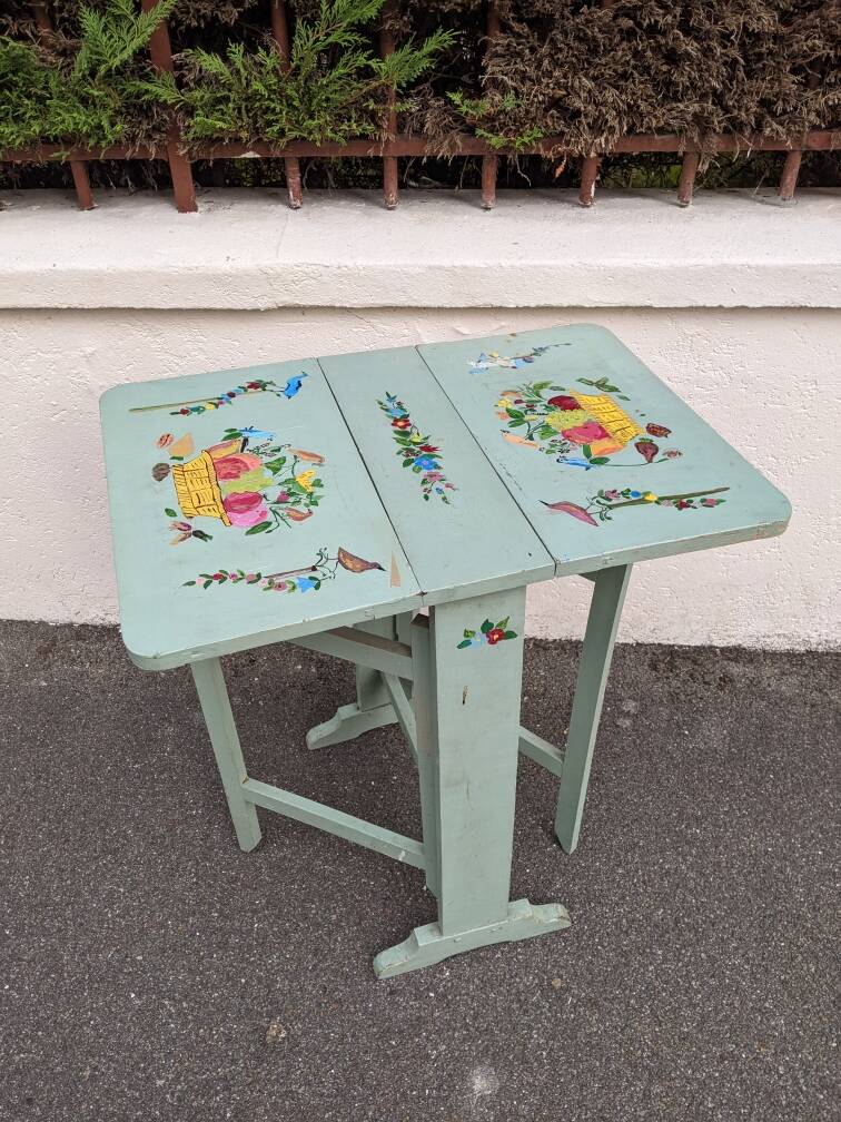Antique Scandinavian table with bohemian country decor and hand-painted decor