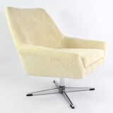 Cream corduroy swivel shell armchairs