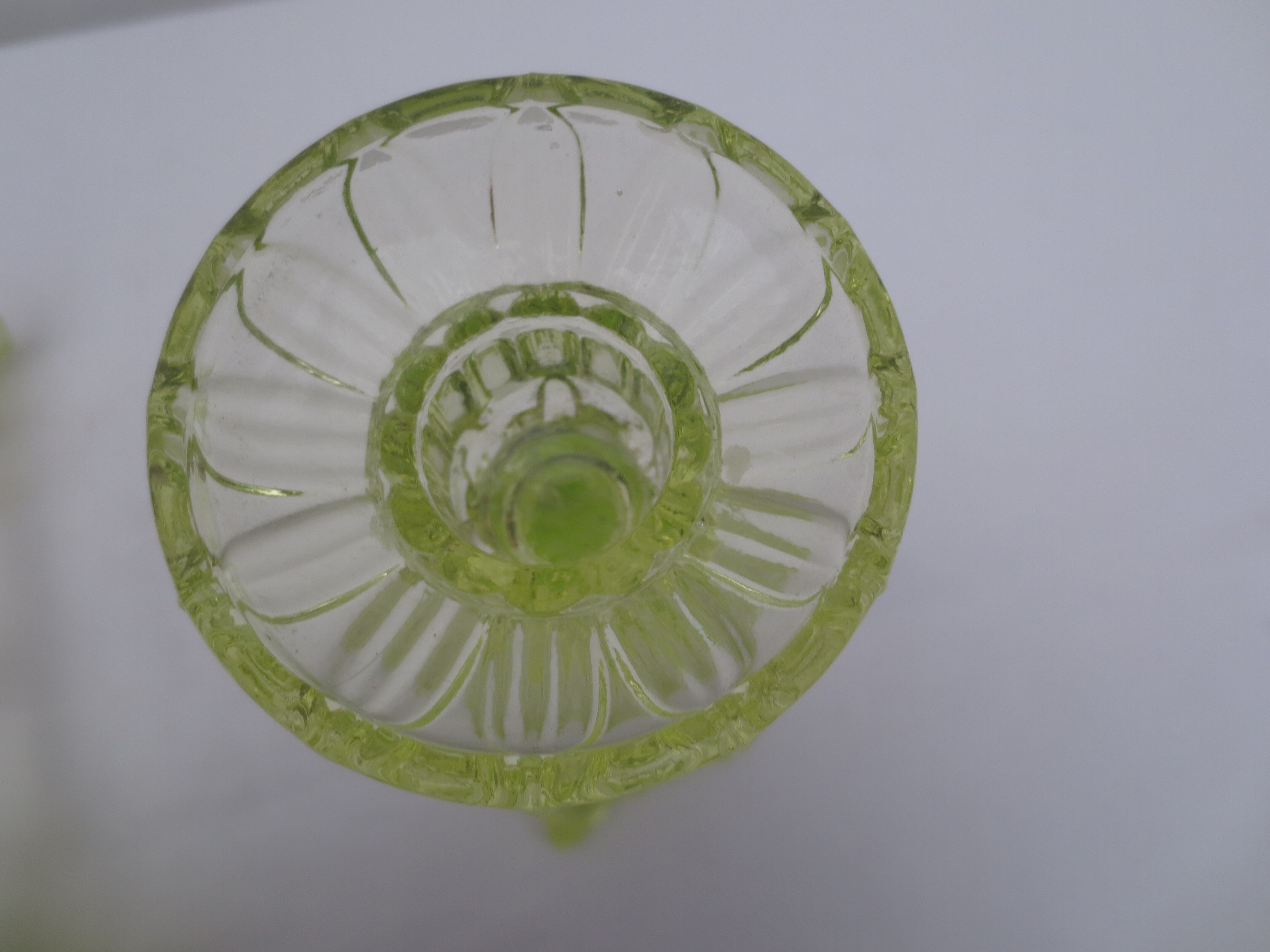 pair of old anise-green glass candlesticks