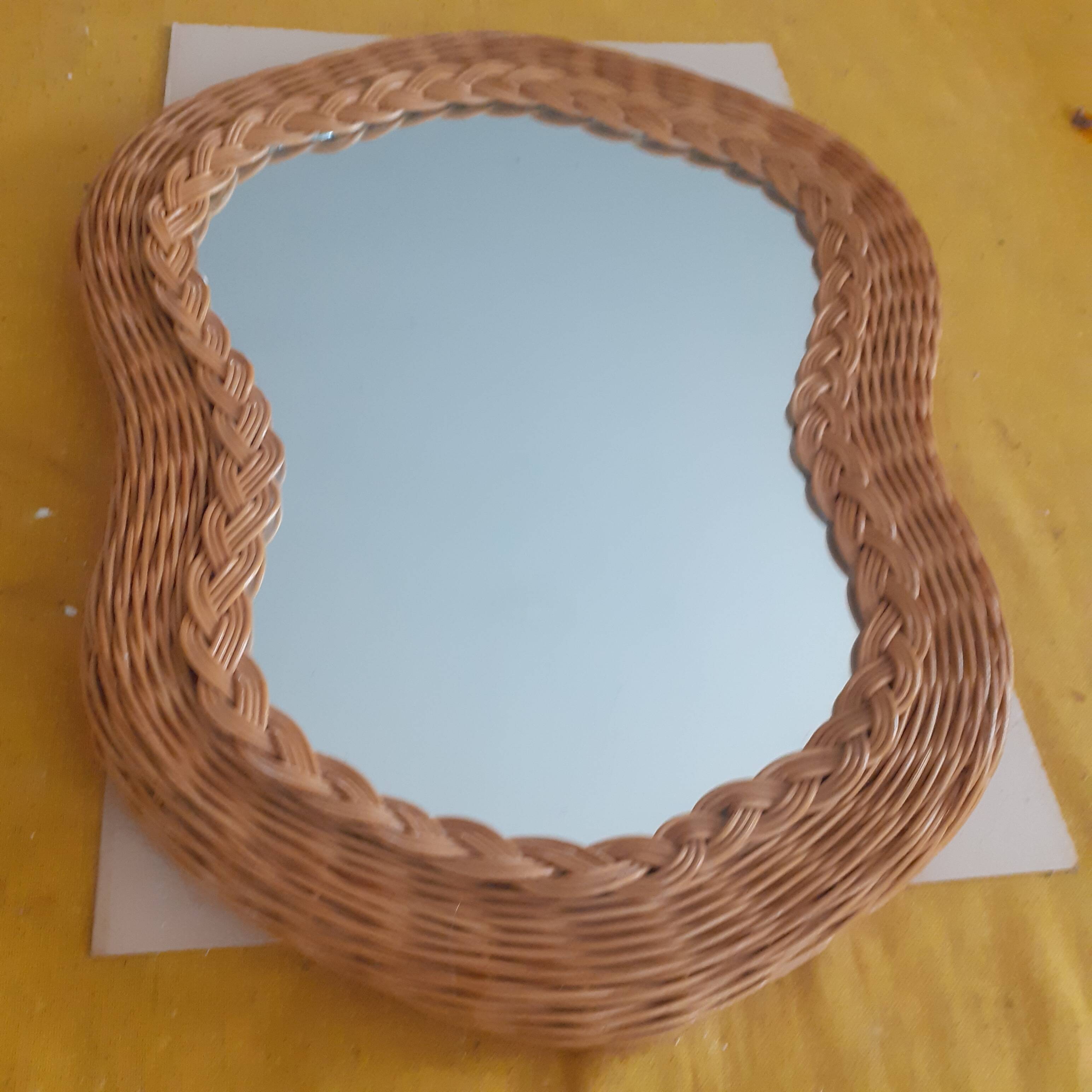 Rattan mirror, bean shape.