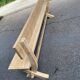 Monastery bench with a 220 cm backrest, renovated in raw solid oak with X legs.