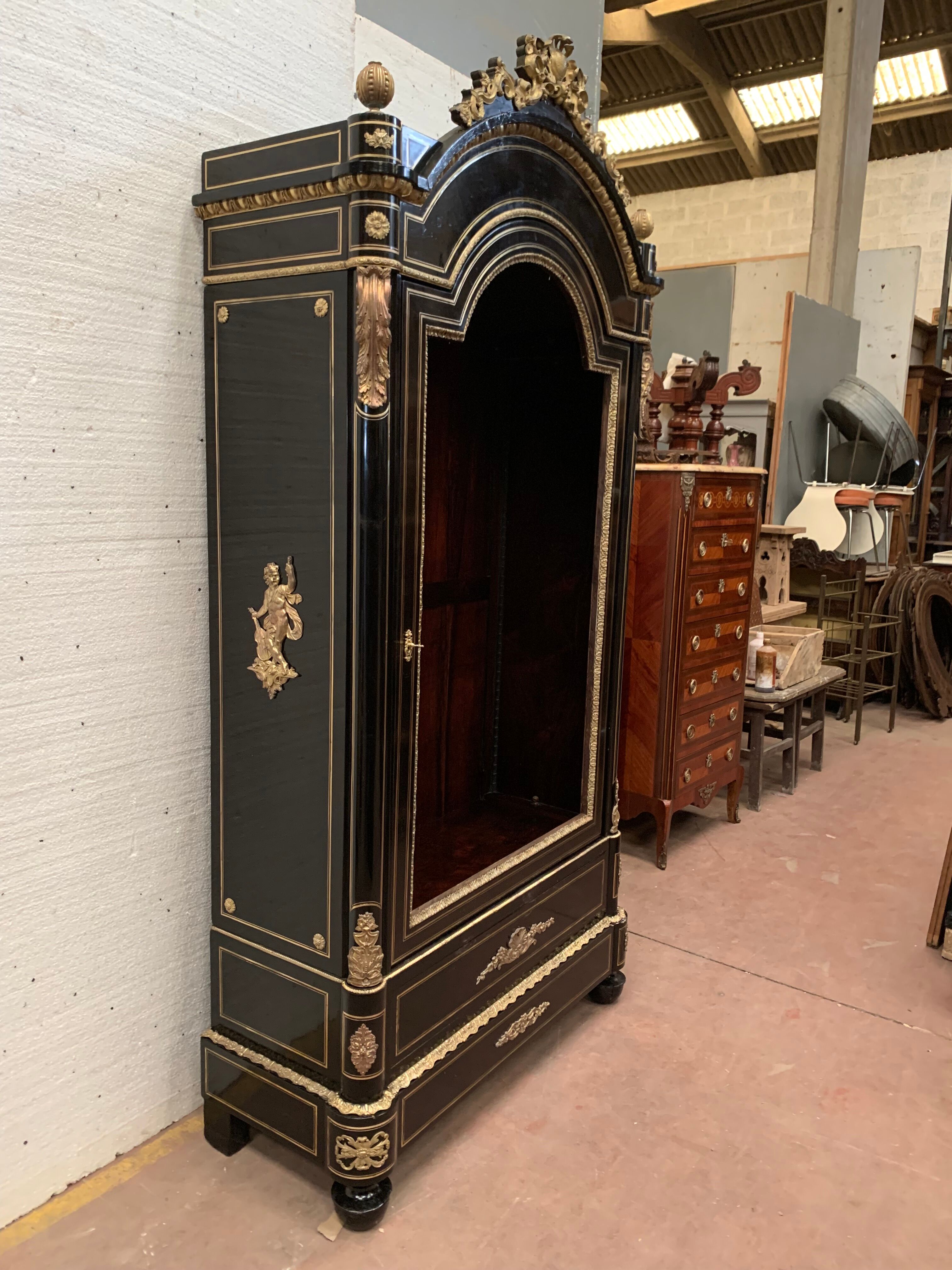 Napoleon III ceremonial showcase in black wood and gilded chiseled bronze XIX century