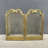Antique brass fireplace screen from 1920, vintage spark guard.