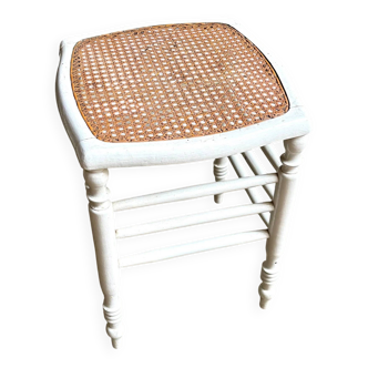 White wooden stool with caning