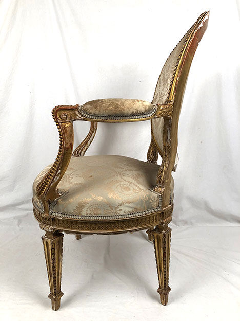 Carved and gilded wooden armchair in Louis XVI style, circa 1900