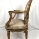 Carved and gilded wooden armchair in Louis XVI style, circa 1900