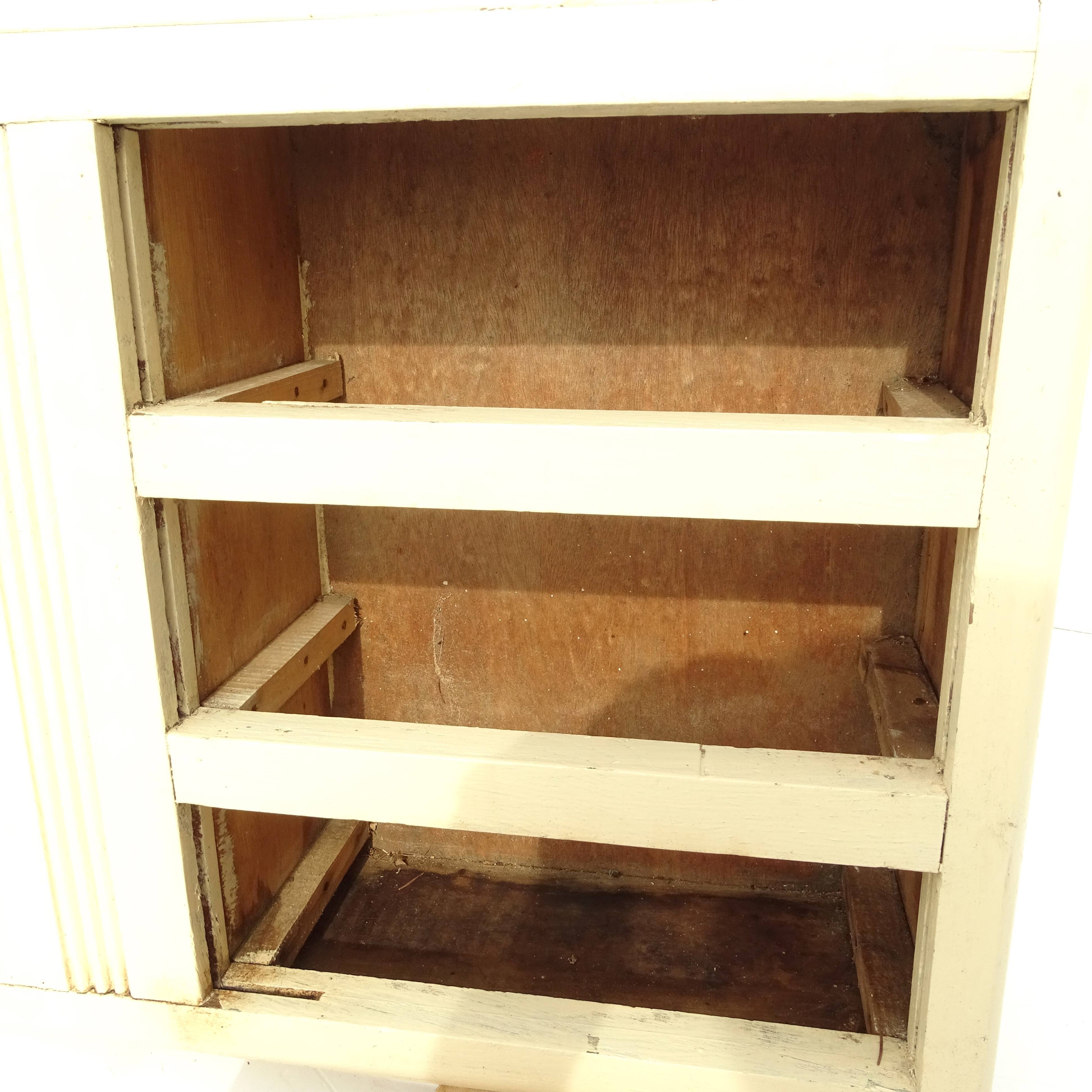 Small vintage wooden wall cupboard.
